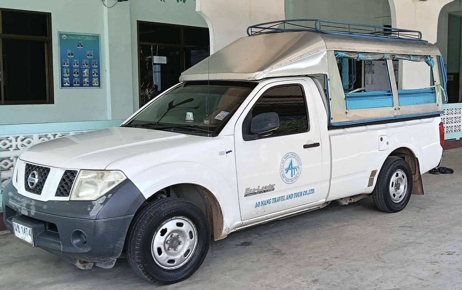 Ao Nang Travel and Tour pickup truck for complimentary hotel drop-off after ferry arrival at Nopparat Thara Pier, Ao Nang