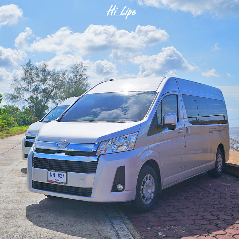 Toyota HiAce van parked near the sea for Hat Yai Airport to Koh Lipe shared transfer