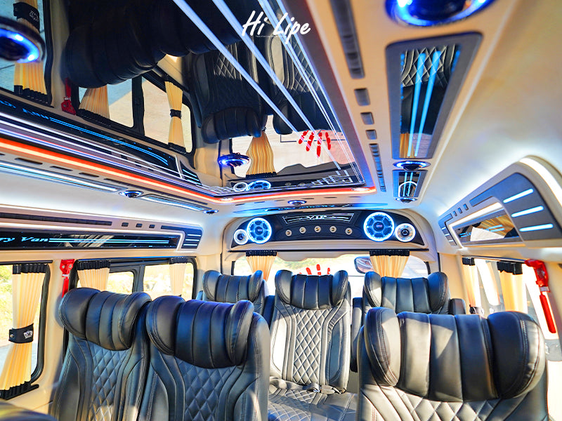 Luxury van interior with LED lighting and reclining seats for Hat Yai to Koh Lipe transfer