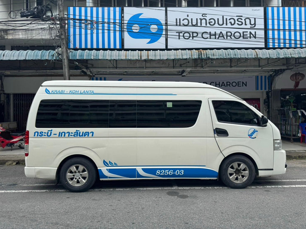 Krabi–Koh Lanta minivan van on the road – shared transfer service by Jijie Tour and Travel