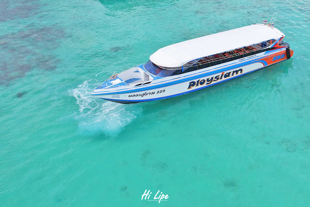Ploysiam speedboat on turquoise sea near Koh Lipe
