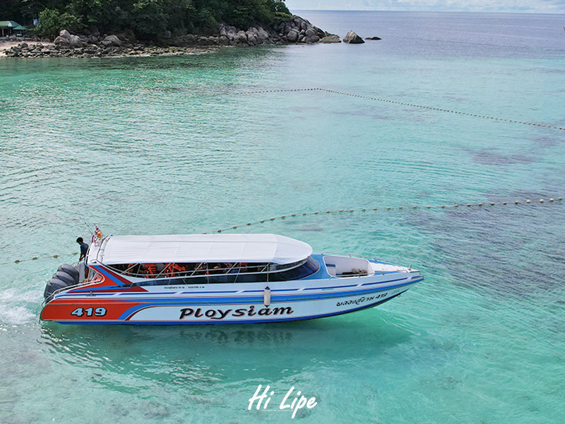 Ploysiam speedboat departing from Koh Lipe turquoise sea for transfer to Pak Bara Pier