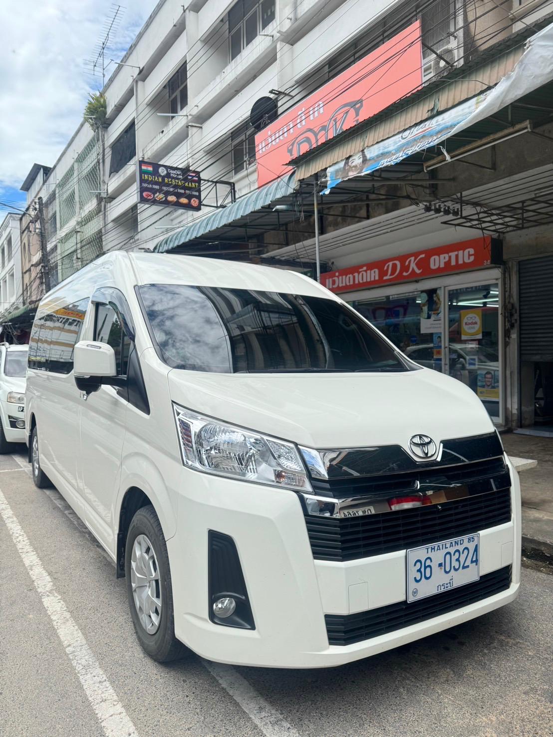 White Toyota HiAce van for private transfer from Ao Nang and Krabi to Phuket Airport